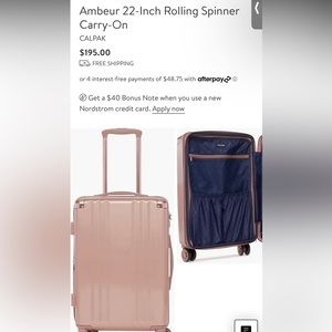 Calpak Ambeur Rose Gold Carry on suitcase
